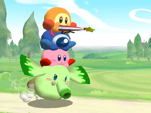 Screenshot of Kirby GCN showing Kirby and three helpers colored yellow, blue, and green riding piggyback.