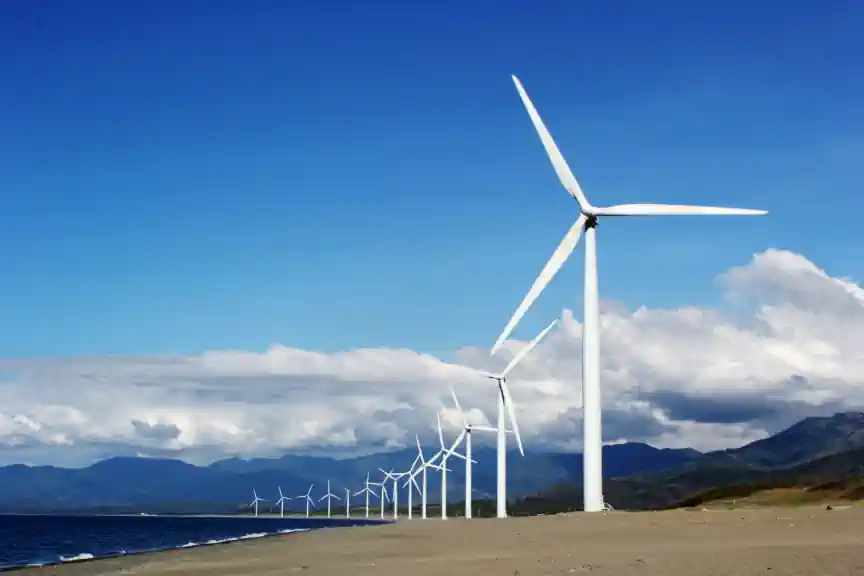 Wind turbines on a shore.